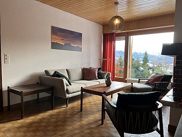 Ferienwohnung in Crans-Montana - Wohnzimmer mit toller Aussicht