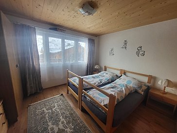 Ferienhaus in Camuns - Schlafzimmer