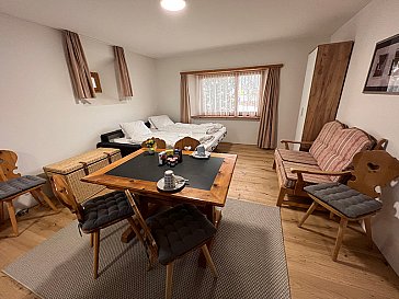 Ferienwohnung in Samedan - Wohnzimmer mit Sofabett