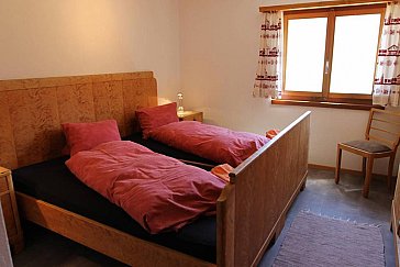 Ferienwohnung in Samedan - Schlafzimmer