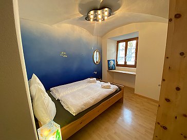 Ferienwohnung in Samedan - Schlafzimmer