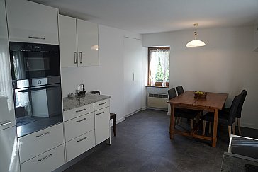 Ferienhaus in Grono - Küche mit Essbereich zum Verweilen